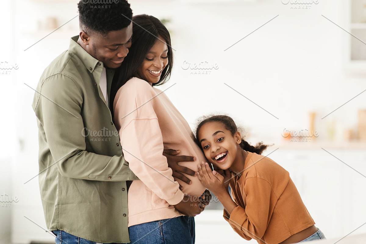 Happy Black Family Hugging Expecting Baby In Kitchen At Home, a Photo by Prostock-Studio (Photo 4 of 5)