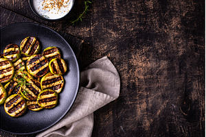 Grilled zucchini with sauce, vegan, a Food & Drink Photo by Yulia Furman