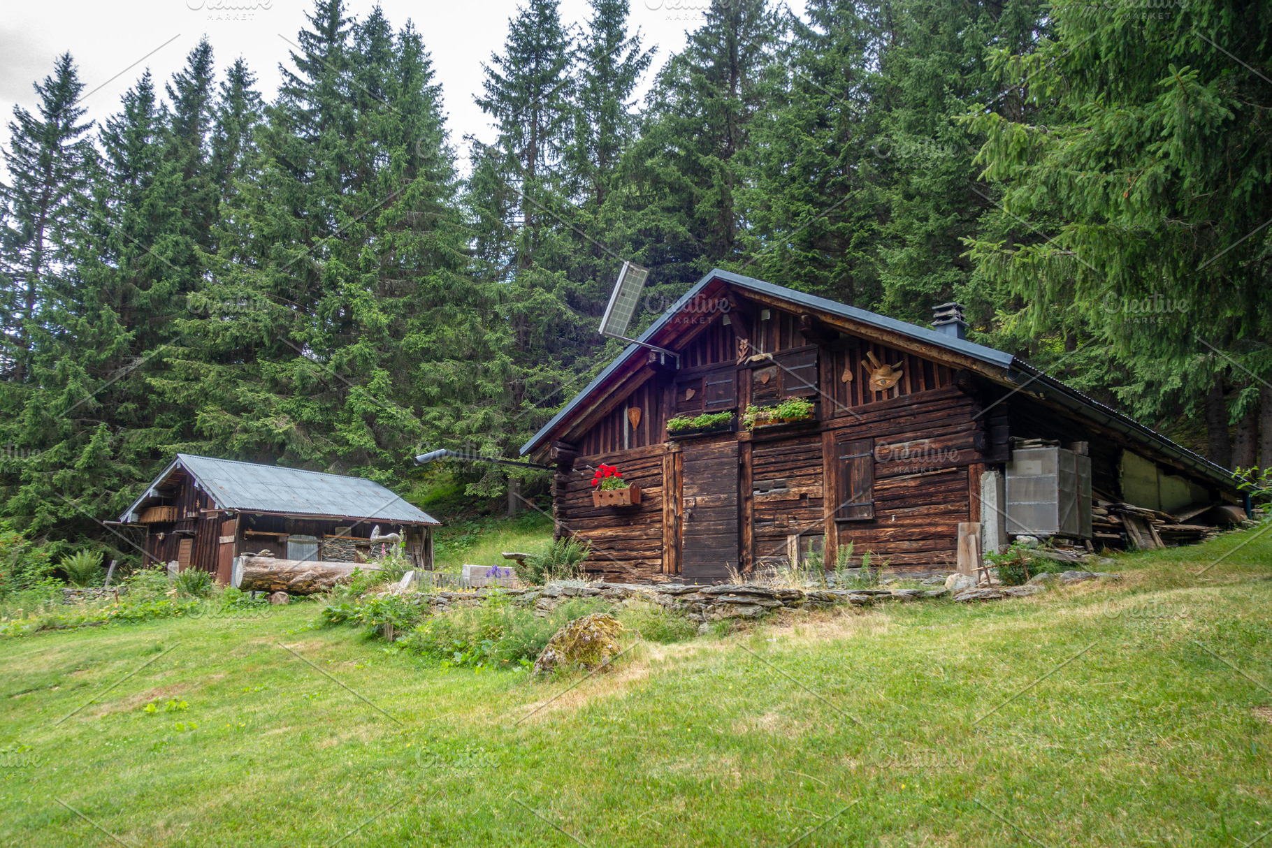 Traditional wooden chalet in forest Contamines Montjoie, France, an Architecture Photo by GoodGoods