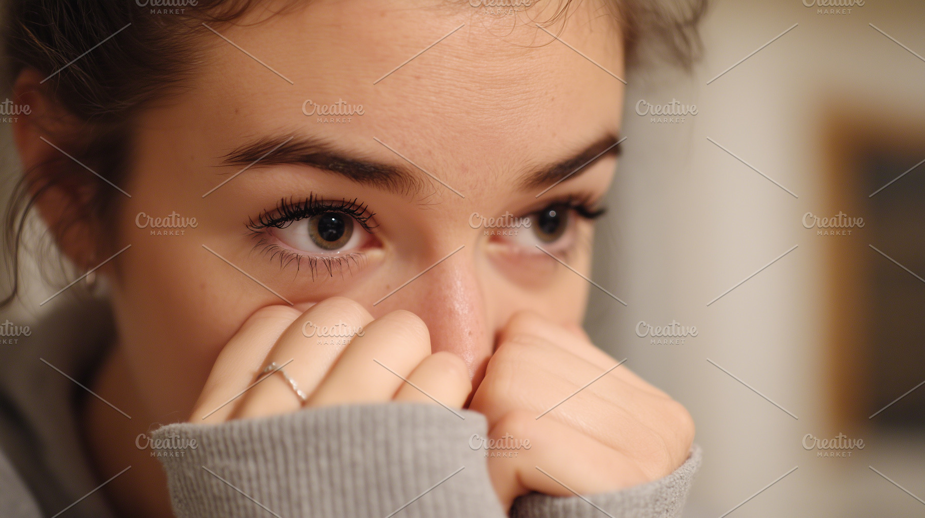 Anxious young woman covering her, a Person Photo by MistyDay