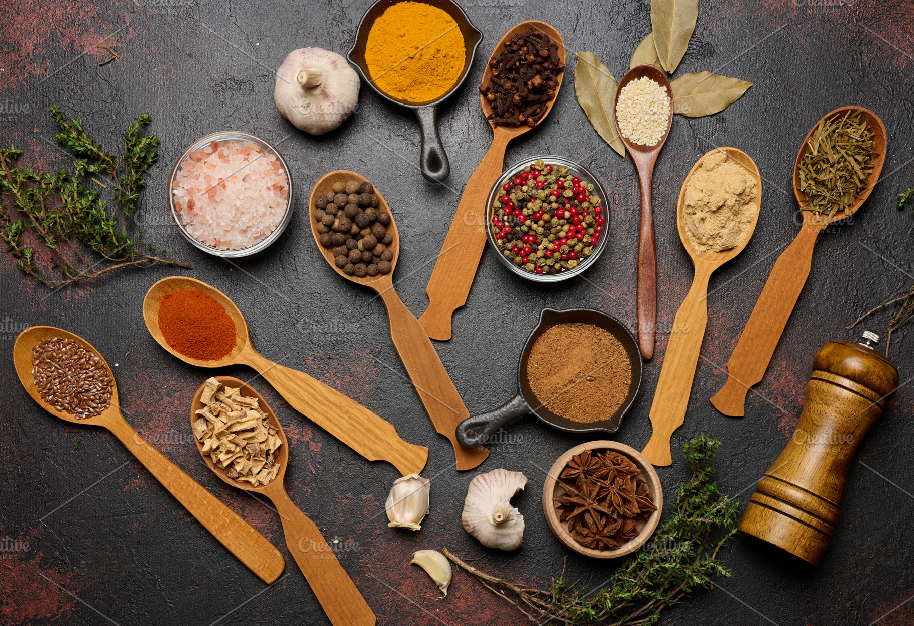 Spices in spoons and bowls on a dark background turmeric, paprik, a Food & Drink Photo by ndanko