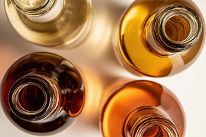 Glass bottles with liquids, a Photo by Beautiful things