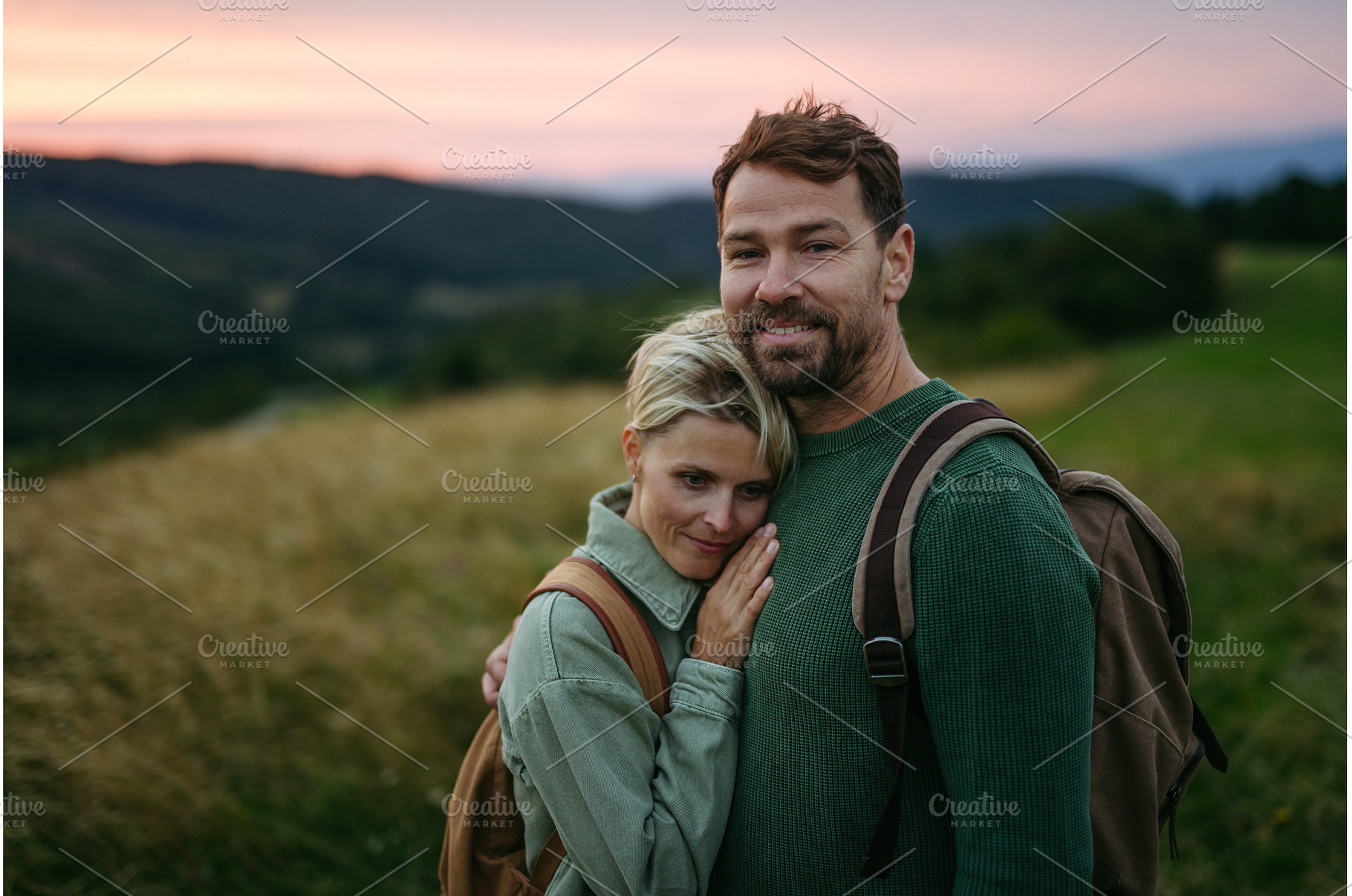 Tourist in love watching sunset., a Nature Photo by HalfPoint