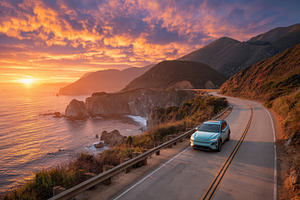 Electric SUV driving scenic coastal, a Photo by Pixeness Studio