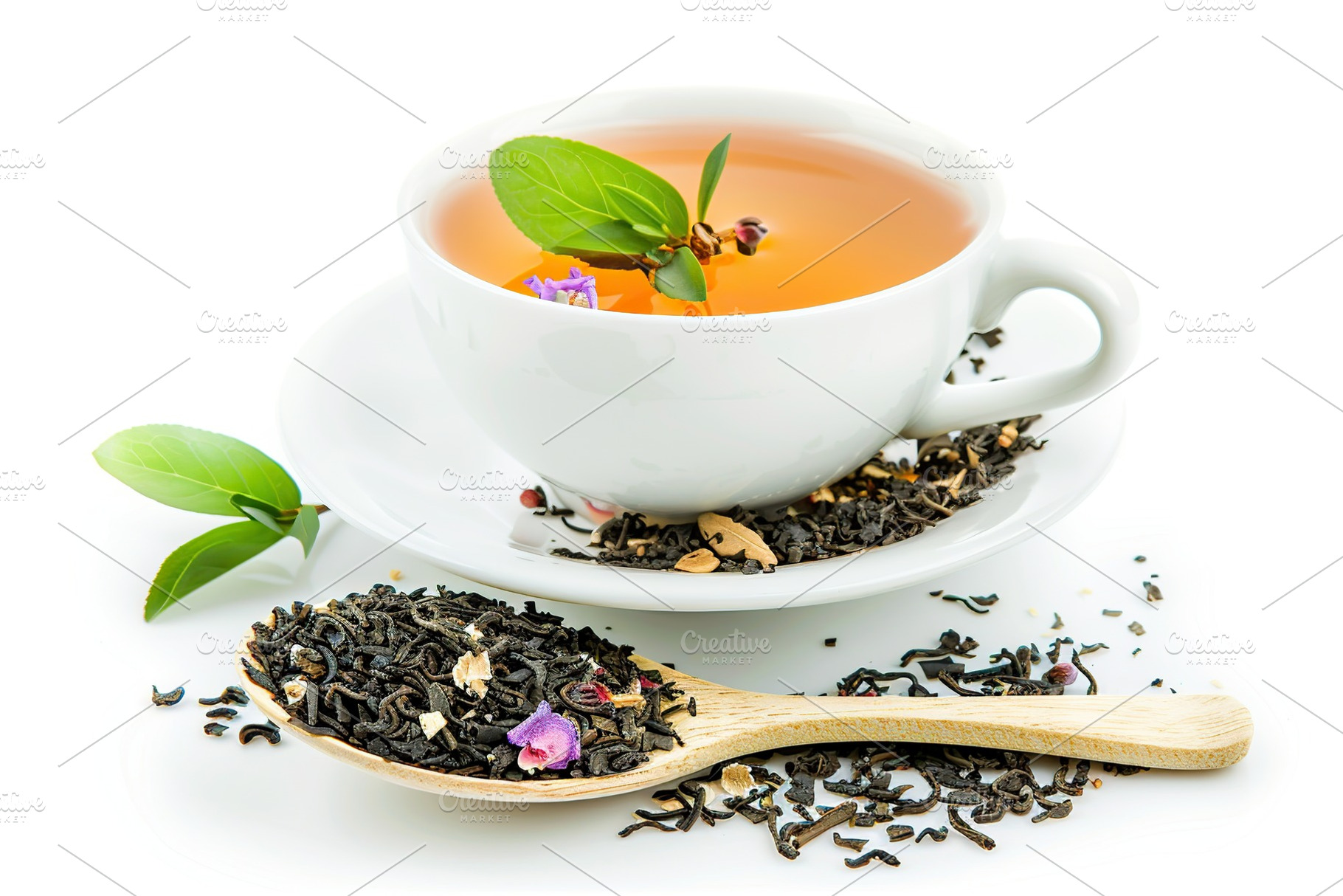 White cup of aromatic tea on white background, a Food & Drink Photo by AlyaAnd