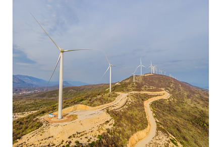 Wind turbines on beautiful sunny, an Industrial Photo by Elizaveta Galitskaya