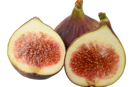 Whole and piece ripe purple figs on isolated background, a Photo by ndanko