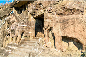 Carved elephants at the entrance of Cave 16, the Ajanta Caves, an Architecture Photo by Leonid Andronov