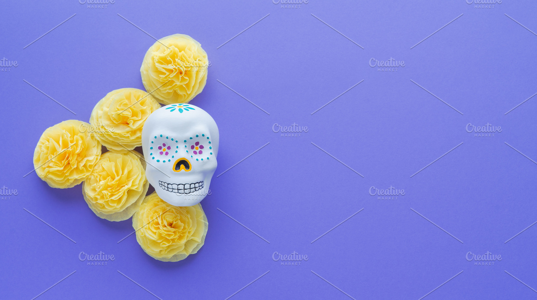 Mexican skull with yellow flowers, a Holiday Photo by Mineko