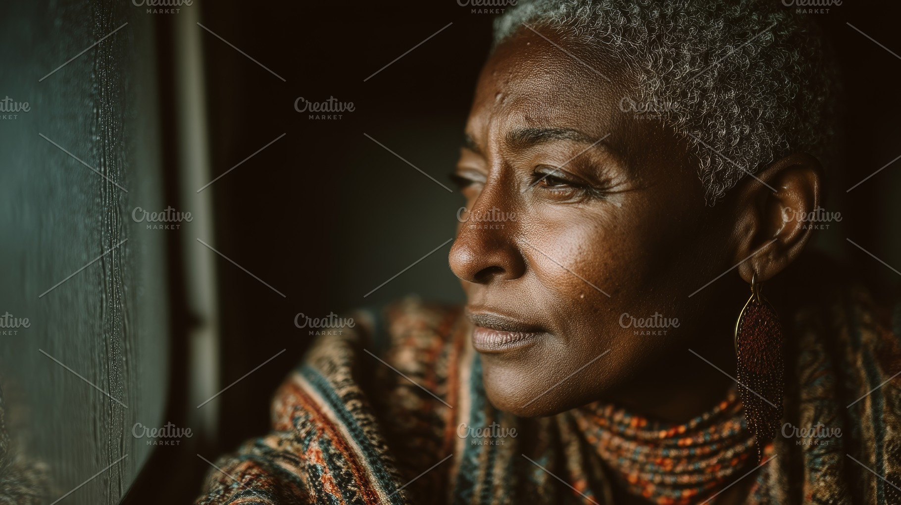 Senior woman portrait looking thoughtfully out of a window, introspective matur, a Photo by AS photostudio