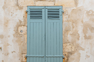 Window with green painted shutter featuring re, aged, and ancient