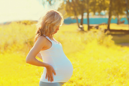 Portrait of happy young pregnant wom, a Person Photo by Rohappy