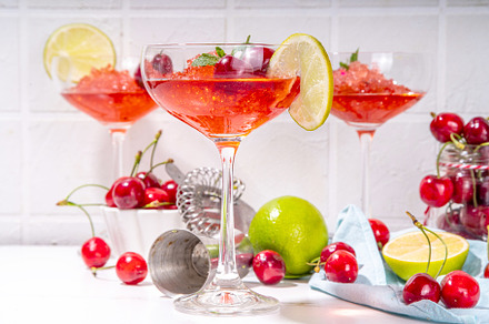 Cherry and lime alcoholic booze cocktail, a Food & Drink Photo by Rimma