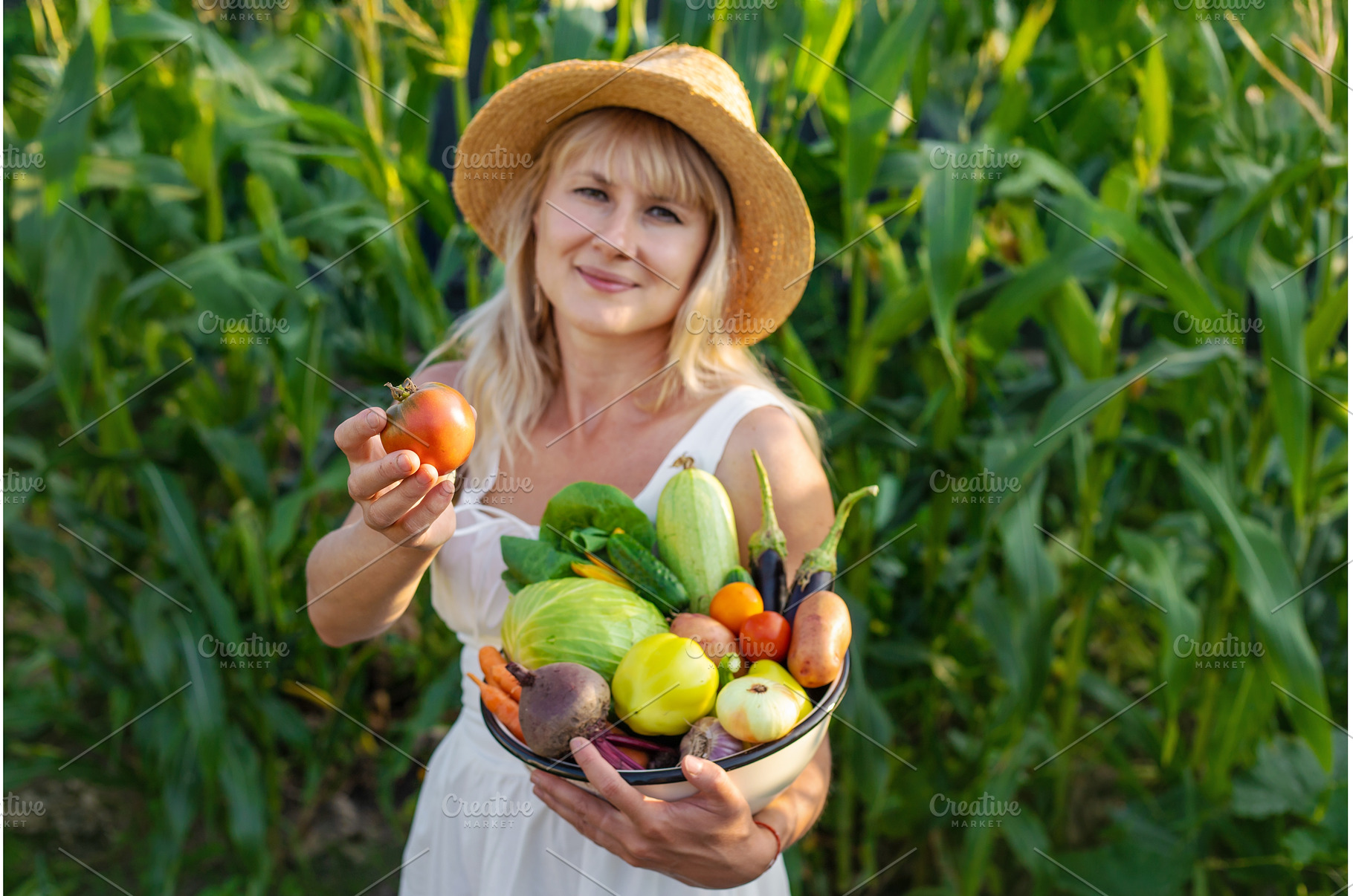 Vegetable harvest with a woman in a, a Nature Photo by yanadjana