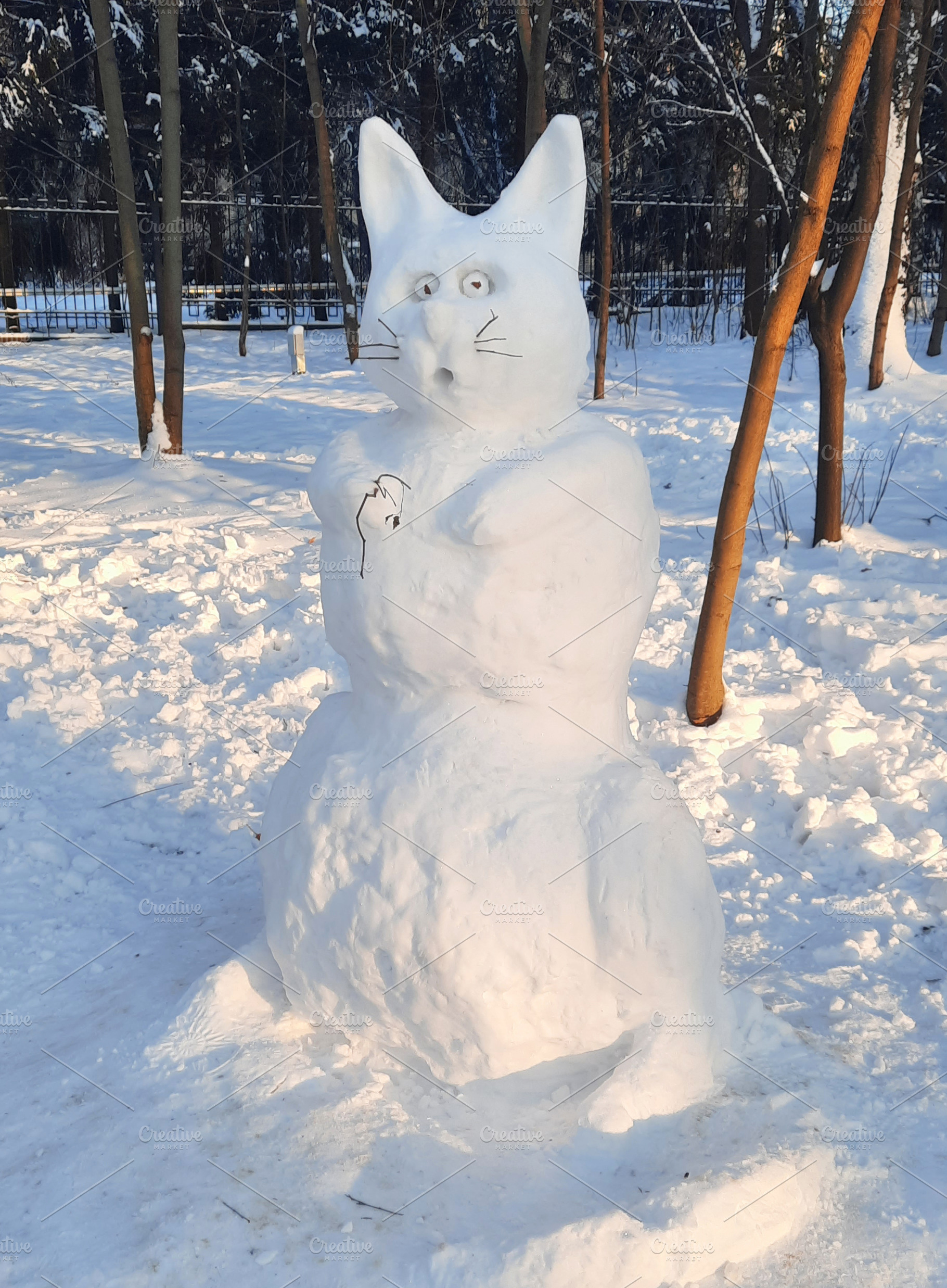 snow cat funny outdoor winter sculpt, a Photo by Famapictura