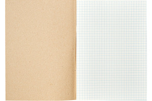 An open notebook with a kraft paper cover and white grid-lined p, a School & Education Photo by ndanko