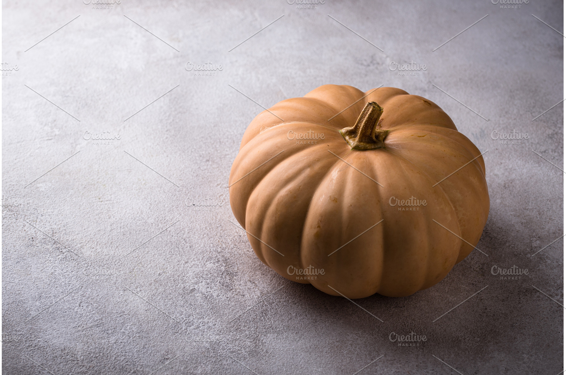 Raw fresh cut pumpkin on dark, a Food & Drink Photo by Yulia Furman
