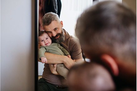 Father comforting his crying baby, a Person Photo by HalfPoint