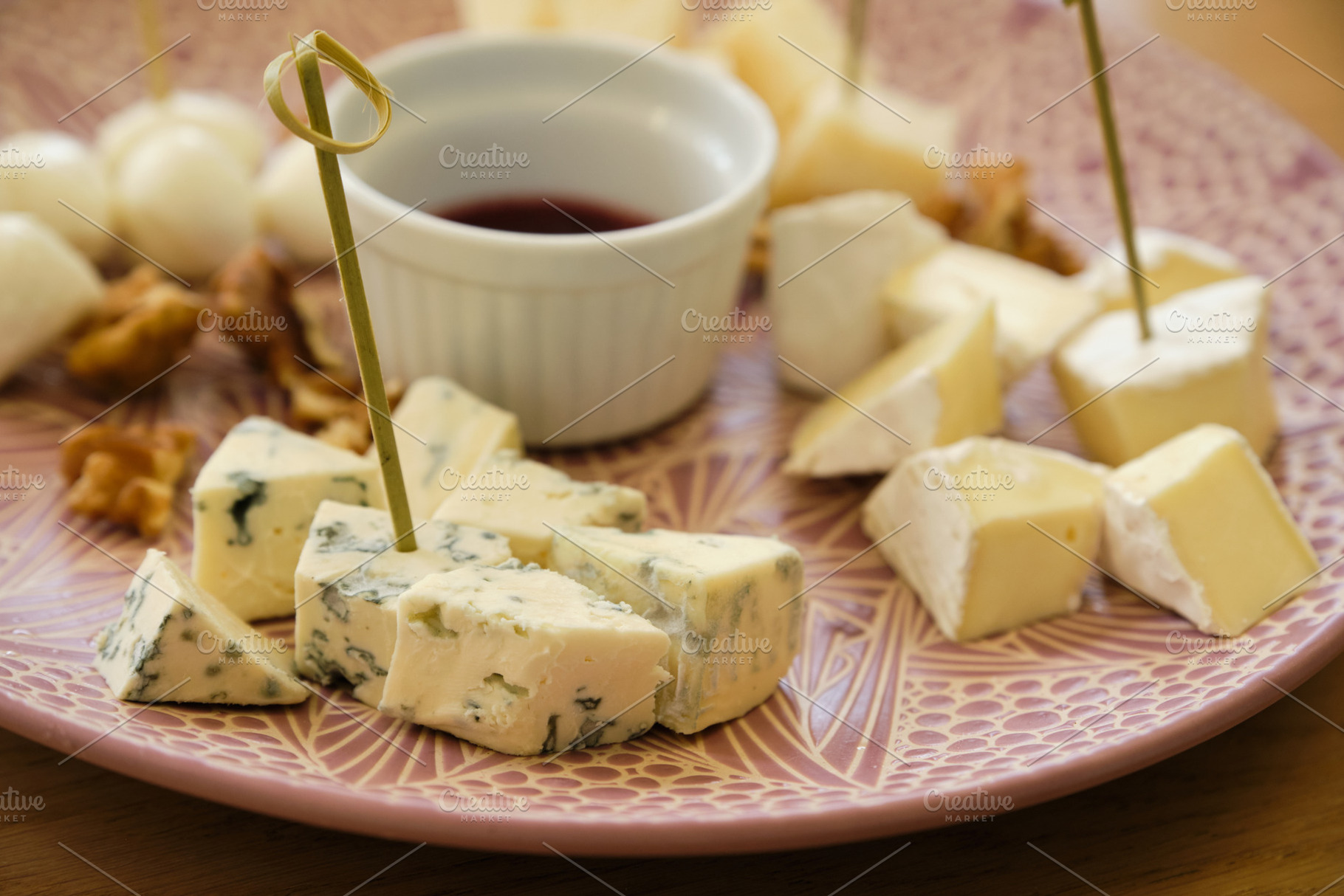 Close-up of cheese platter with blue cheese, camembert, mozzarella and walnuts., a Food & Drink Photo by Rohan Photography