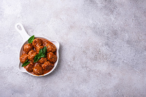 Homemade meatballs in tomato sauce, a Food & Drink Photo by Yulia Furman