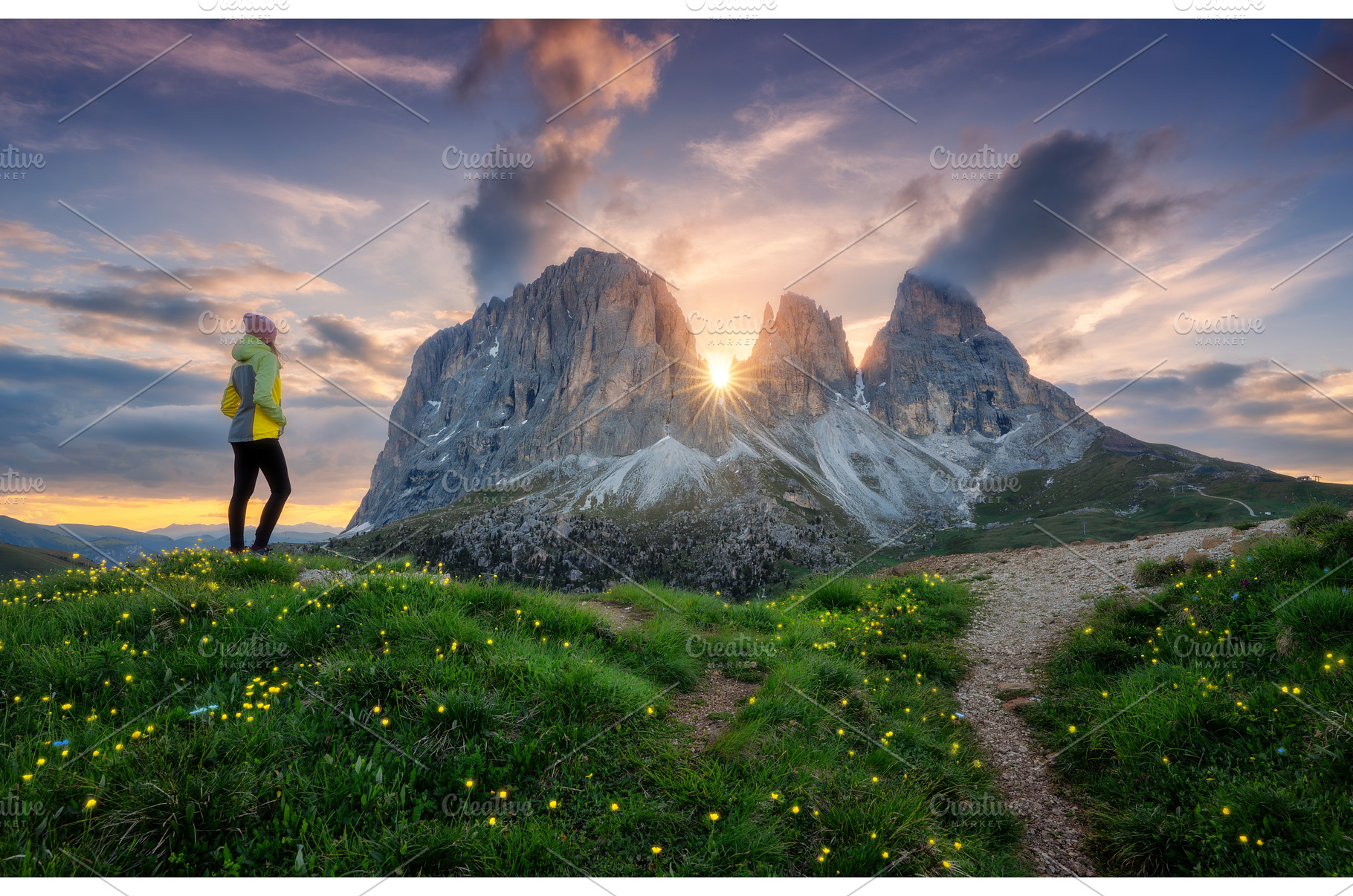 Girl on the hill with yellow flowers, a Person Photo by den-belitsky