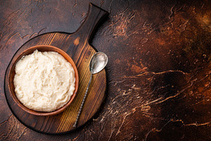 Overhead shot of rich white condiment (aioli or horseradish) in, a Food & Drink Photo by composter-box@mail.ru