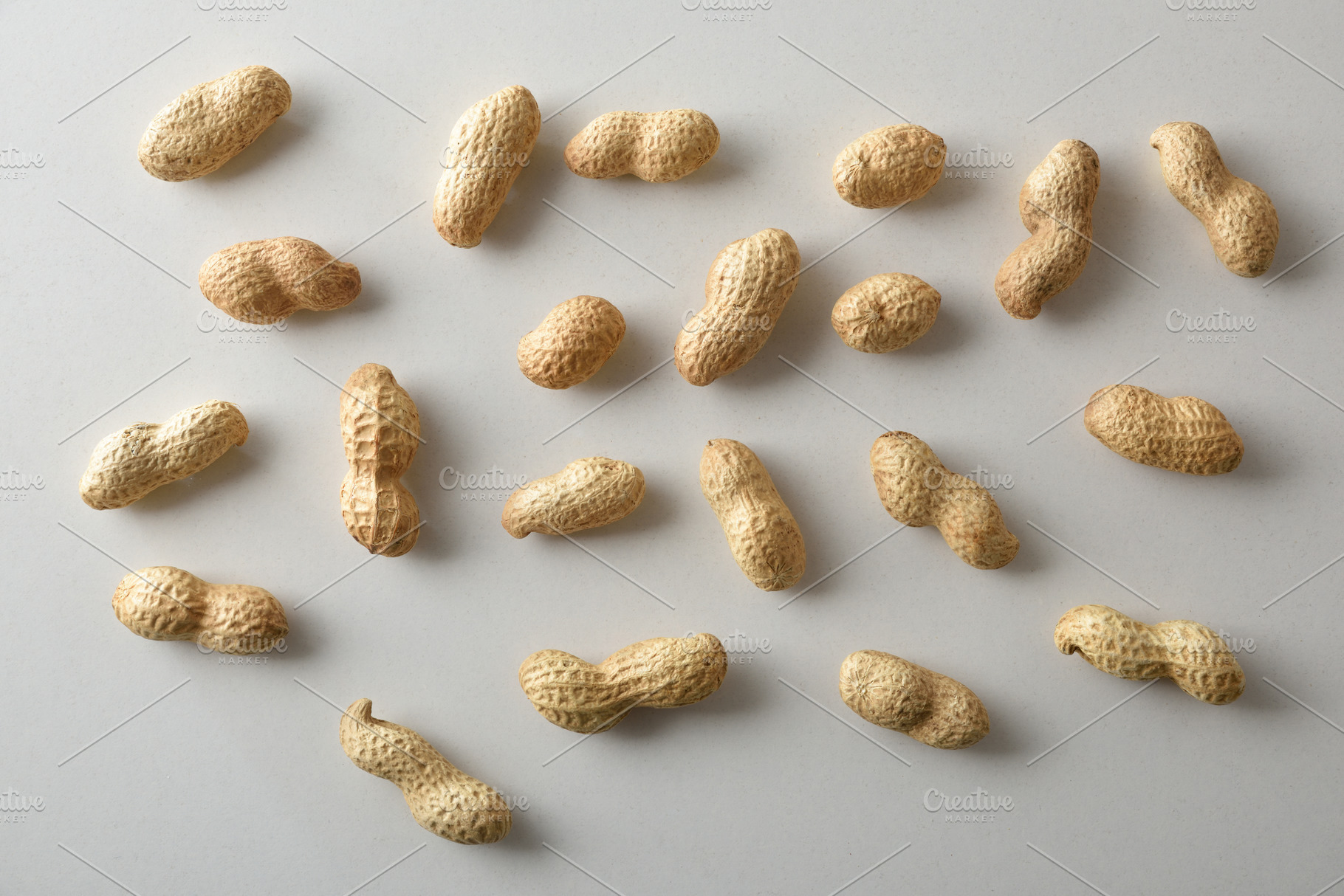 Background of a pile of peanuts in shell top view, a Food & Drink Photo by Davizro's Market