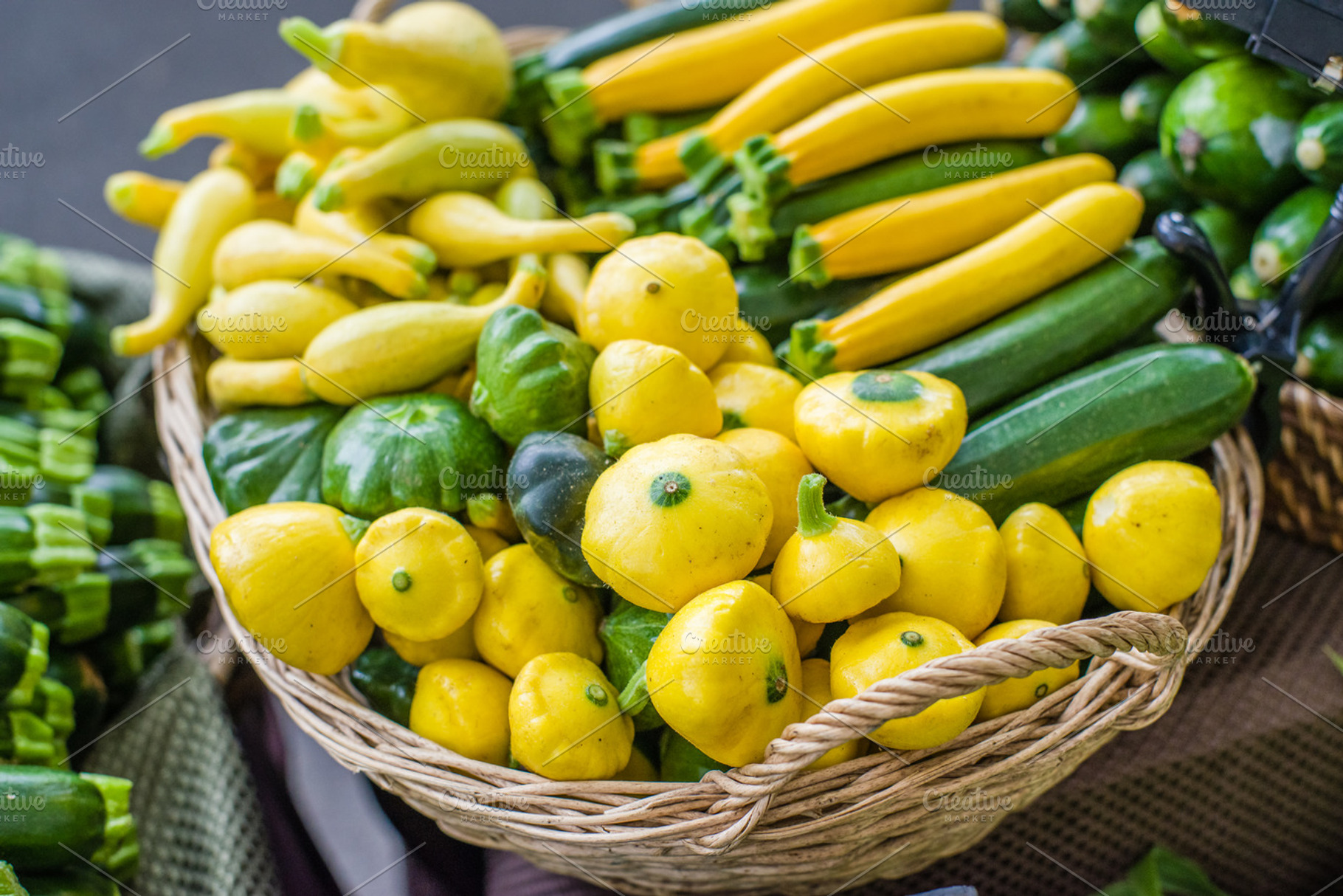Fresh summer squash at the market featuring agriculture, business, and food, a Food & Drink Photo by Zigzag Mountain Art