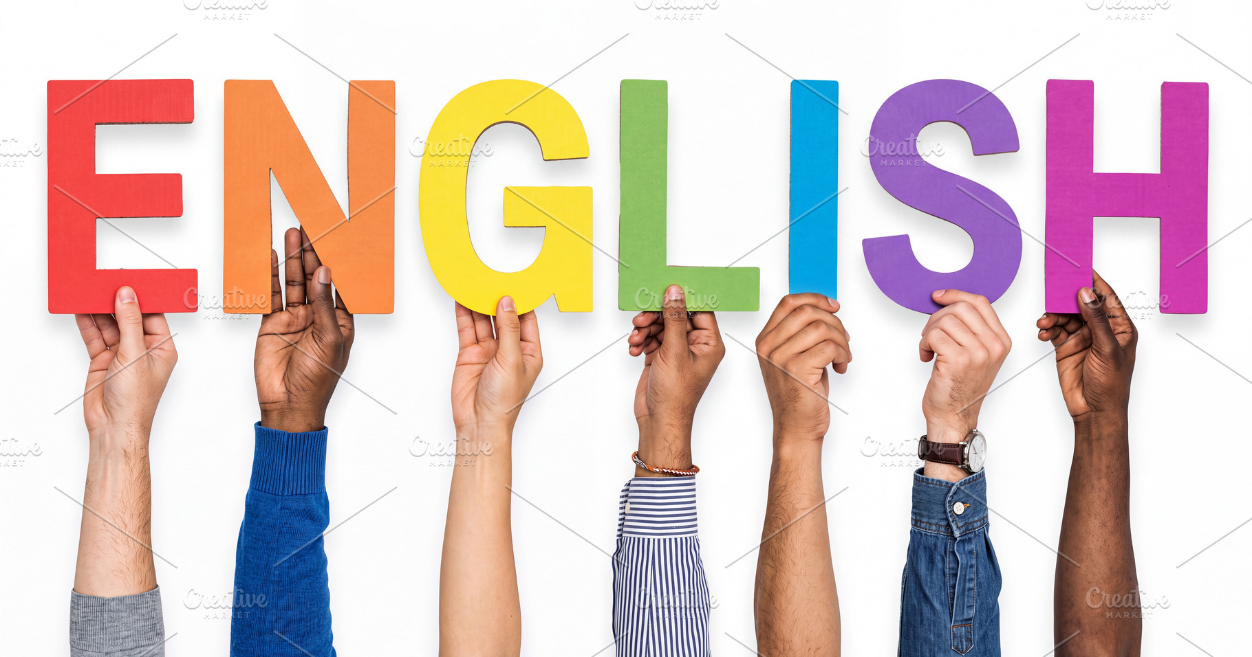Diverse multiracial hands holding colorful cardboard letters for, a School & Education Photo by Volff