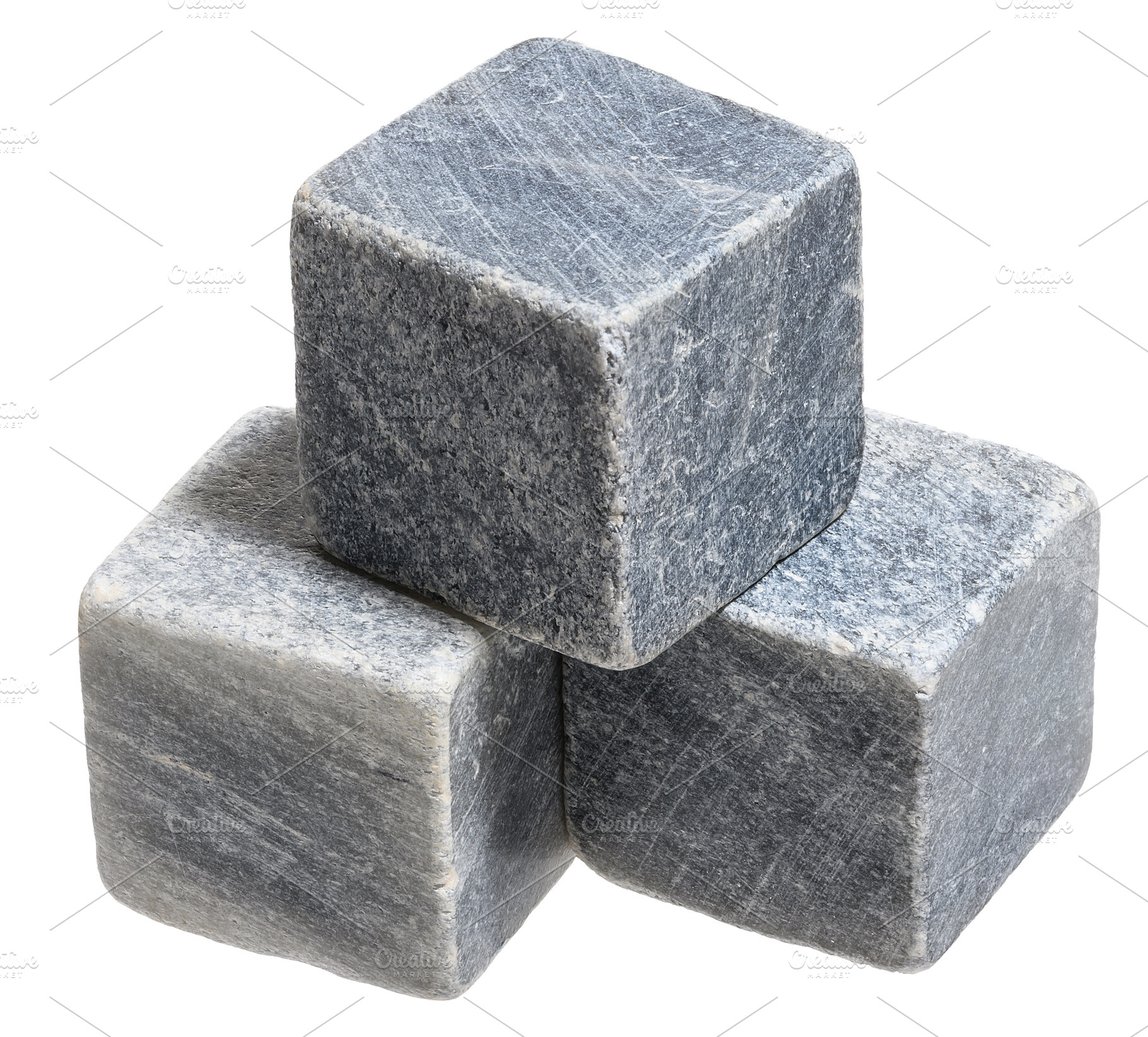 Cube of dark stone with scratches on isolated background, a Background Photo by ndanko
