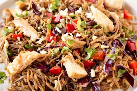 Homemade Spicy Chicken Soba Noodle Salad on a gray platу, low a, a Food & Drink Photo by LiudmylaChuhunova