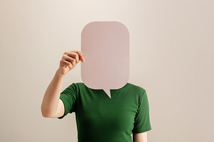 Woman holding a blank speech bubble,freedom of expression, commu, a Photo by salmon.black