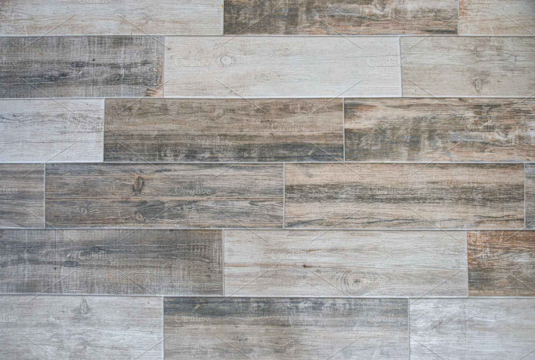 Flooring covered with imitation wood tiles in brown tones, a Background Photo by Davizro's Market