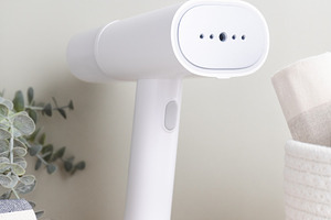 White handheld portable steamer next, a Technology Photo by Edalin's Store