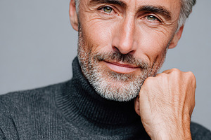 Studio portrait of an attractive man with a stylish turtleneck and confident ex, a Person Photo by AlyaAnd