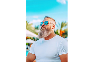 Bearded male in sunglasses and white, a Person Photo by Lermont51