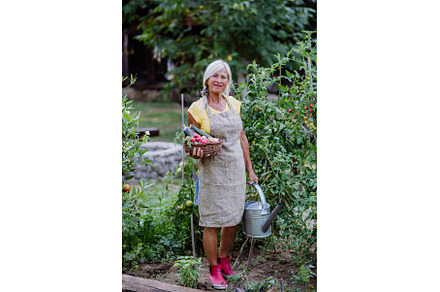 Senior farmer holding basket with, a Person Photo by HalfPoint