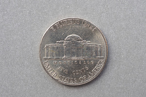 5 cent coin reverse showing Monticello, currency of the USA, a Photo by WorldOfPhotos