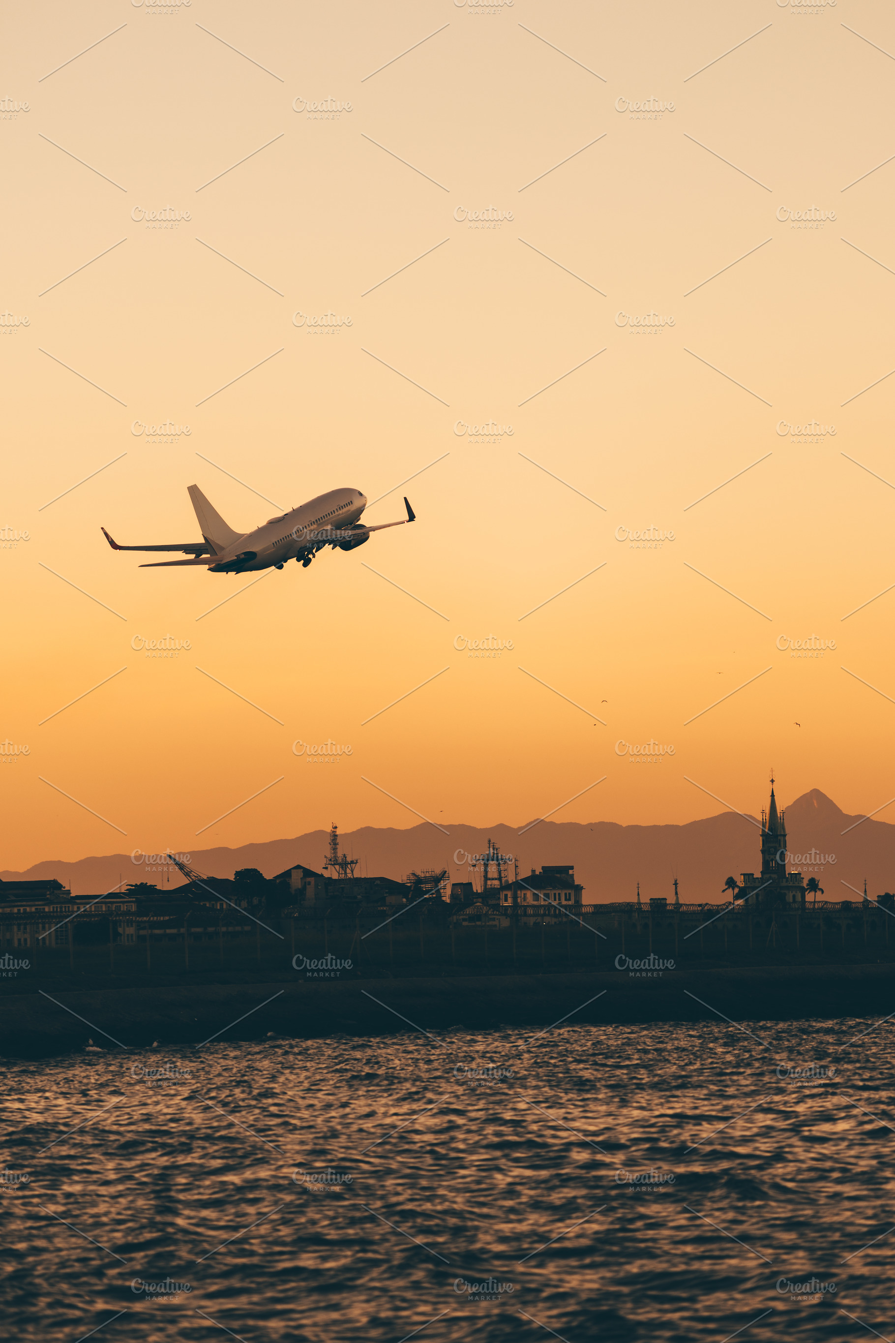 Airplane takeoff at sunset, a Transportation Photo by SkyNext