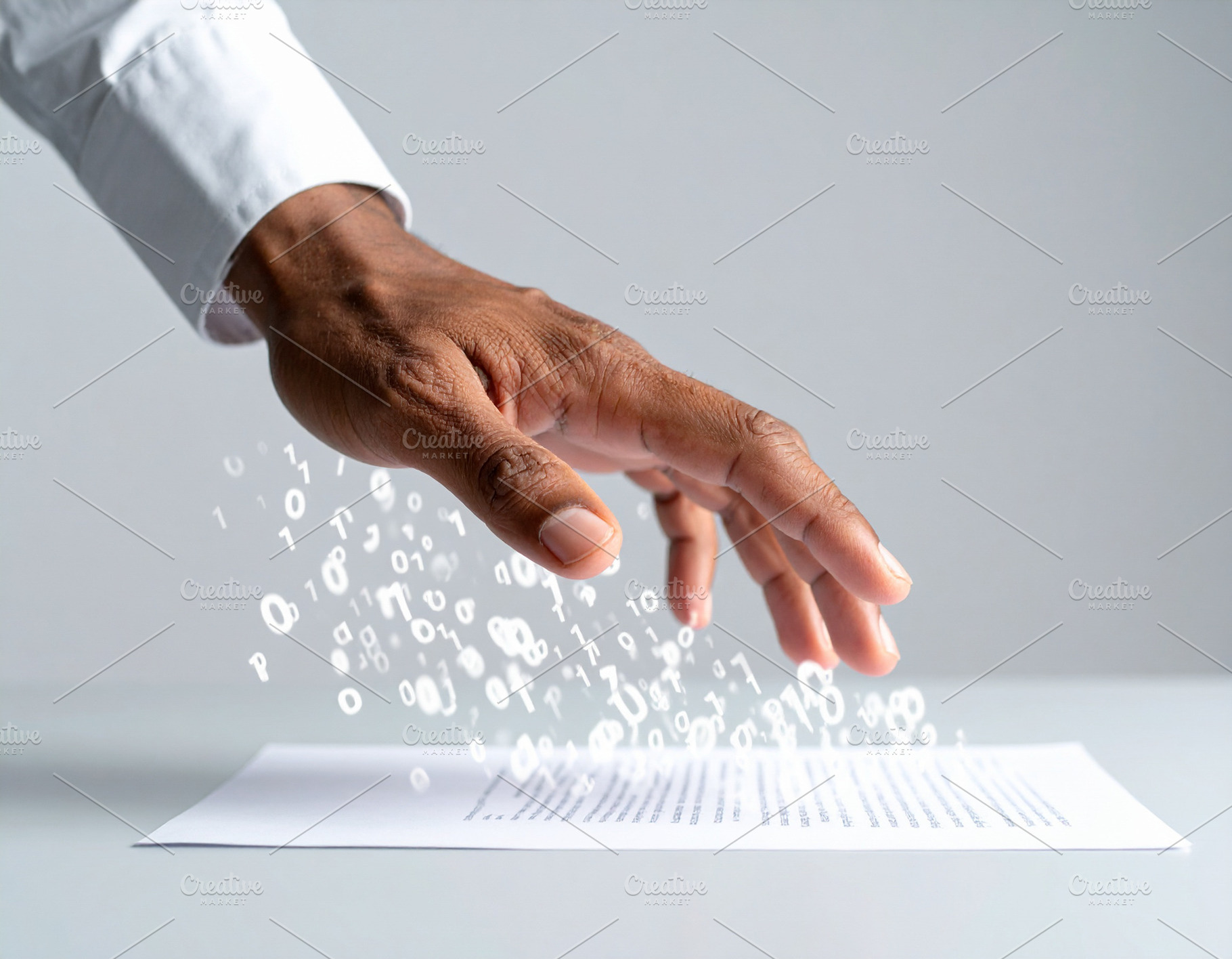 Human hand reaching toward a physical document dissolving into f, a Technology Photo by DanFLCreativo