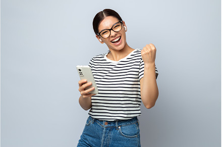 Energized woman with earphones, a Person Photo by AD Stock Images
