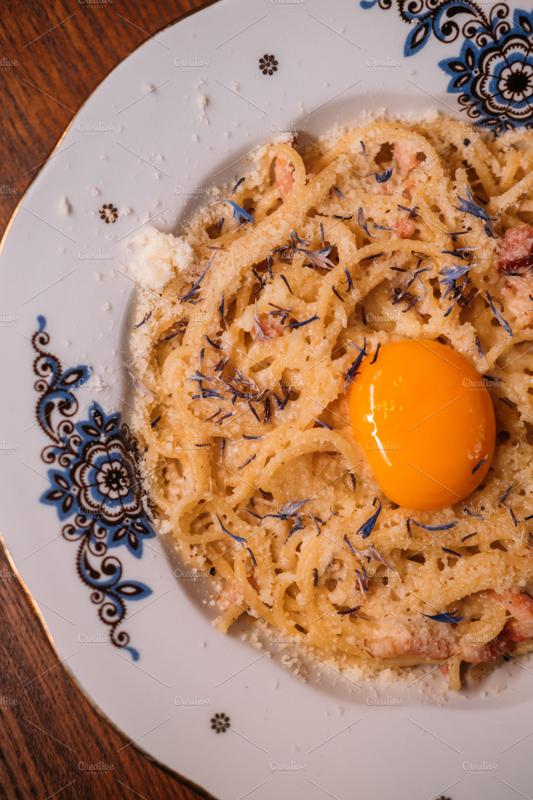 Cooking carbonara gourmet food parmesan egg yolk, a Food & Drink Photo by Photo Drive Studio