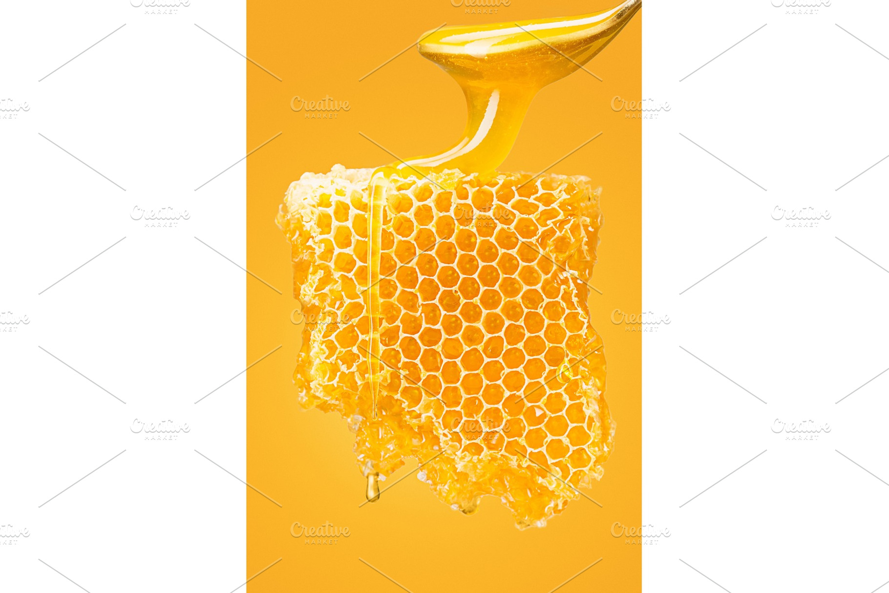 Sweet honeycomb on yellow, a Food & Drink Photo by Volodymyr Melnyk