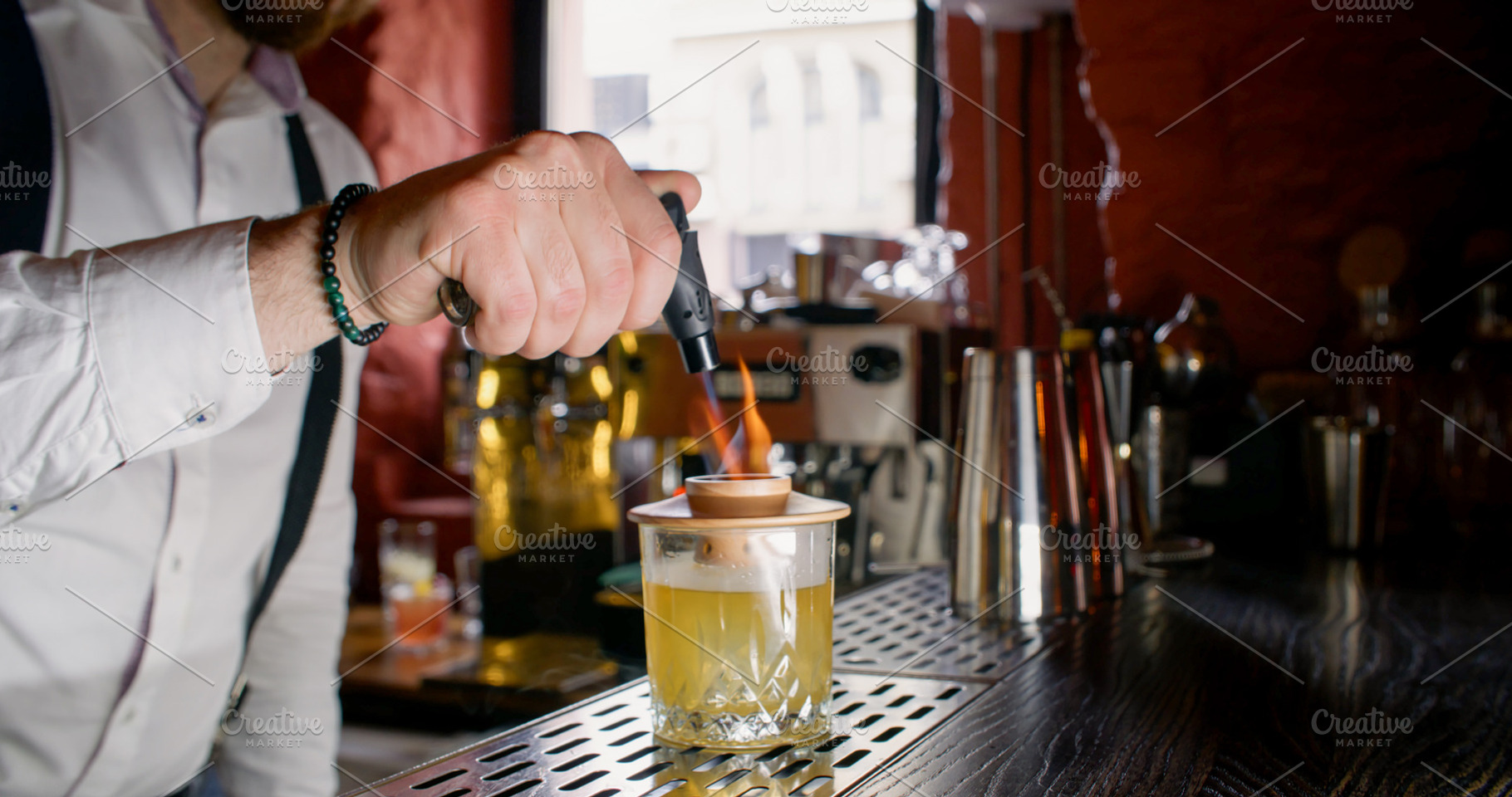 Flaming cocktail fresh alcohol drink hands glass, a Person Photo by Photo Drive Studio