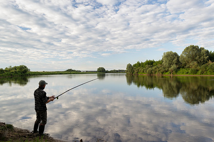 Fishing in river featuring outdoor, coast, and leisure