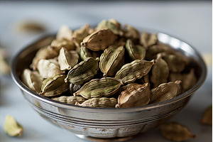 Metal bowl overflowing with aromatic, a Health & Medical Photo by Ylivdesign