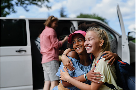 Multiracial young friends travelling, a Person Photo by HalfPoint