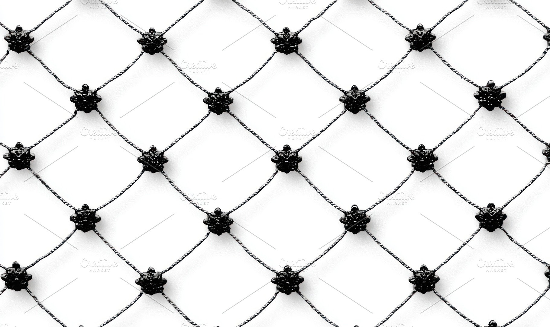 Black knotted rope net with decorative floral-shaped joints on w, an Animal Photo by José Manuel Gelpi