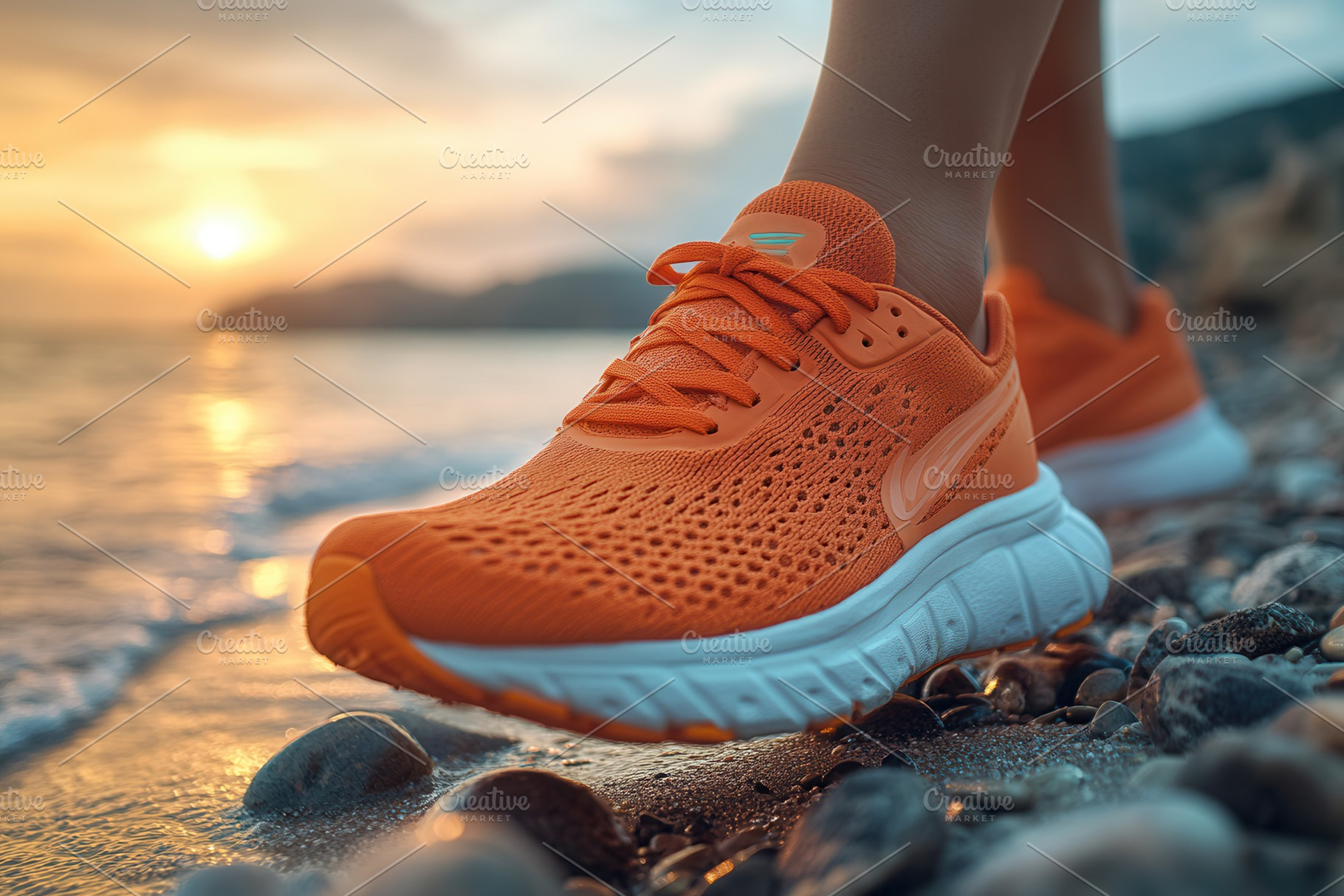 Bright orange sneakers on a rocky be, a Photo by Tanuart
