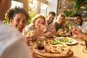 Friends Toasting with Wine at Outdoor Restaurant, a Photo by Davizro's Market